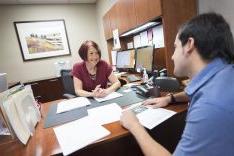 Student talking to faculty