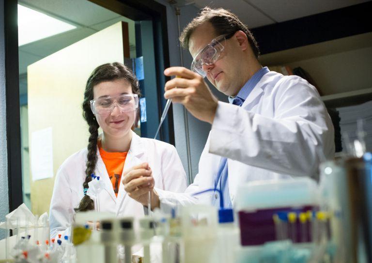 Student and professor in lab