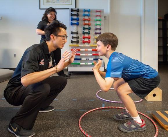 PT student working with child in clinic